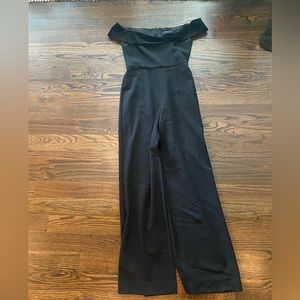 Black halo off the shoulder jumpsuit with velvet top